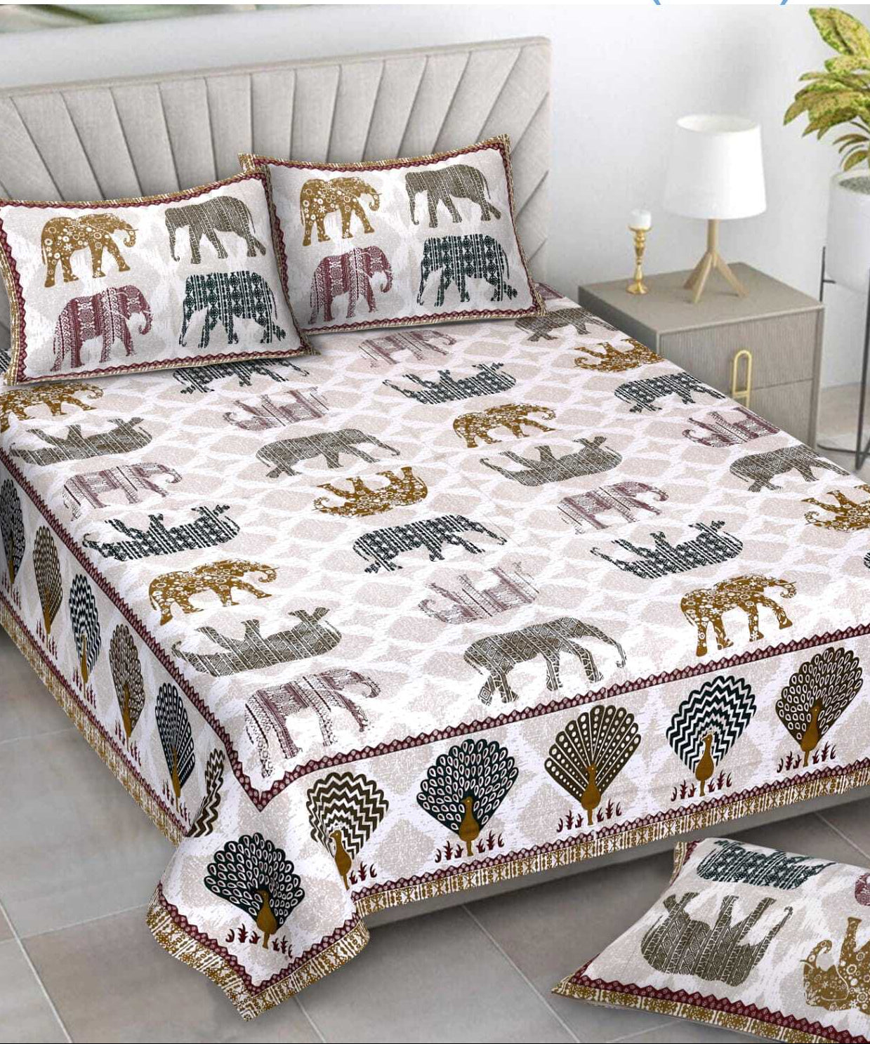 Bedspread set with elephant pattern on a bed in a bedroom setting