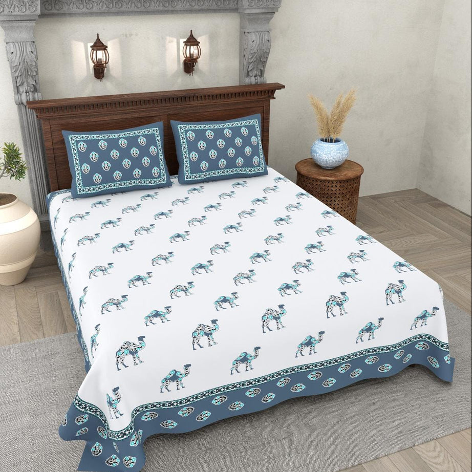 Bed with camel patterned bedding in a bedroom setting